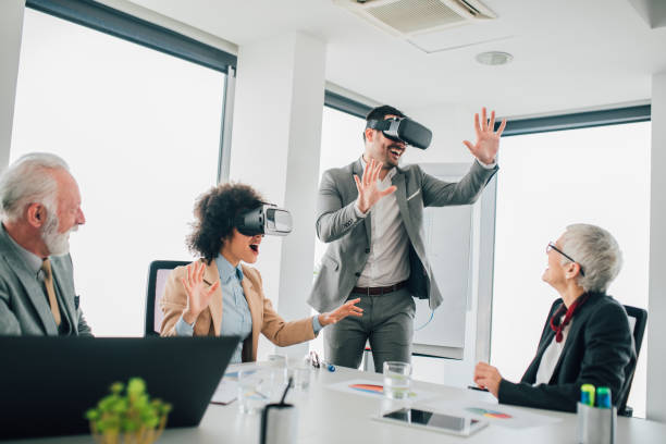 istock Coworkers with virtual reality glasses 1094401086