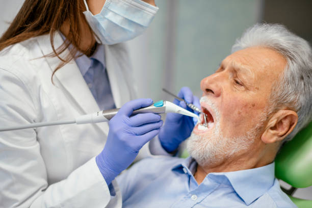 istock Senior man at the dentist 1094402450