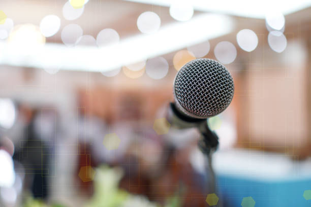 istock Microphone abstract prepare for speaker speech of conference or seminar hall at exhibition room background. Business Talk Presentation concept 1094405968