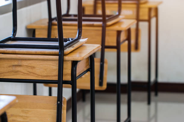 istock Back to school concept. School empty classroom, Lecture room with desks and chairs iron wood for studying lessons in highschool thailand without young student, interior of secondary education 1094406100