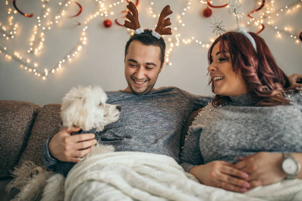 istock Millennial couple playing with cute dog 1094413304