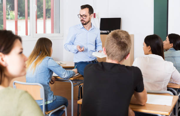 istock Male teacher giving lecture for students 1094413306
