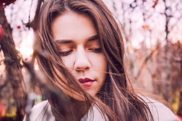istock Beautiful girl in autumn Park 1094415596