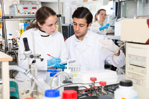istock Students recording results of lab experiments 1094418806