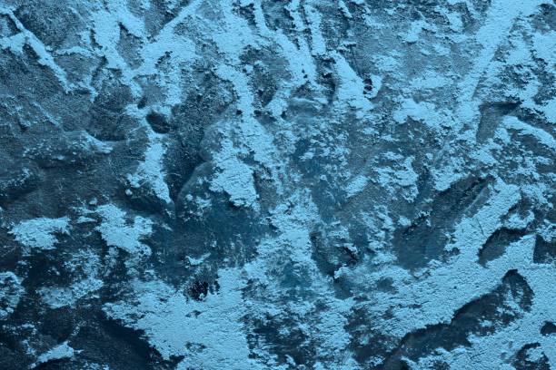 istock light blue dirty artistic plaster on the panel texture - pretty abstract photo background 1094419318