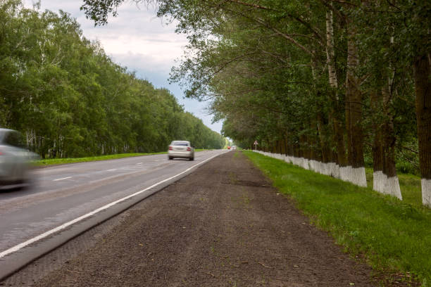 istock blured cars on road 1094422624