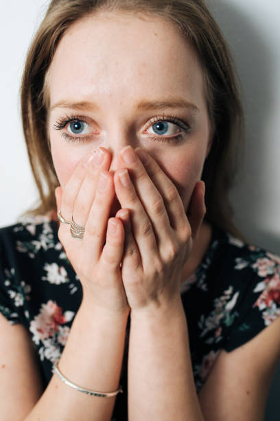 istock Alone and anxious young woman at home 1094424068