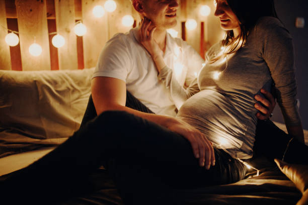 istock Pregnant Mom and her Husband at home 1094427780