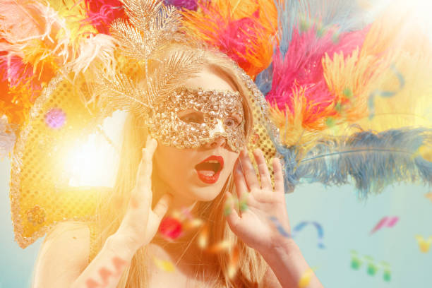 istock Beautiful young woman in carnival mask 1094430244