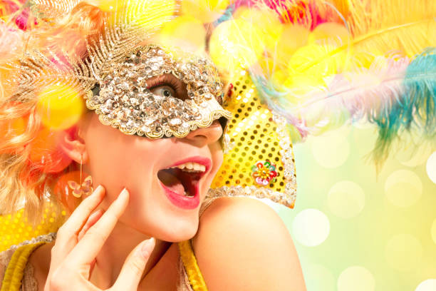 istock Beautiful young woman in carnival mask 1094430292