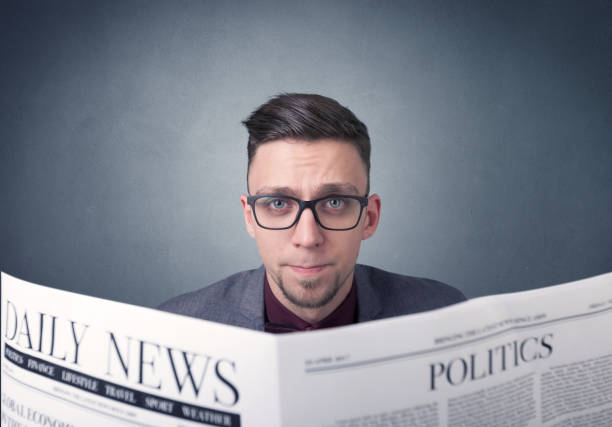 istock Businessman reading newspaper 1094431208