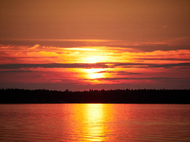istock Red sunset sky with the sun 1094431550