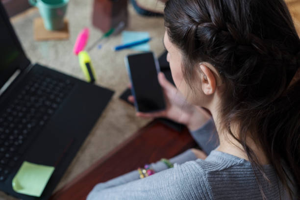 istock Young woman designer working at home 1094432408