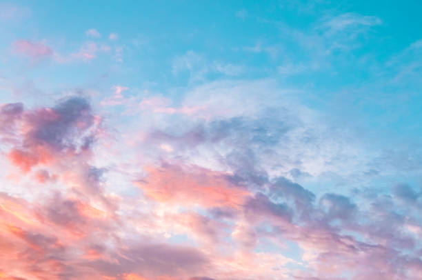 istock Blue sky with pinky and golden clouds 1094435460