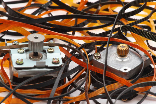 istock Stepper motors with cogged wheels and cog belts 1094436218