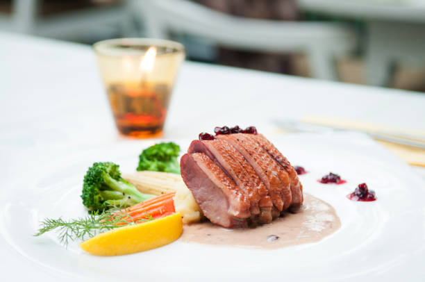 istock Smoked duck breast with cranberry cream sauce 1094439432