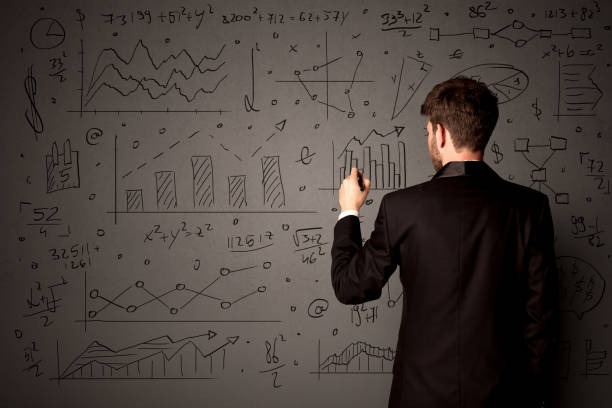 istock Businessman with business plan 1094442064