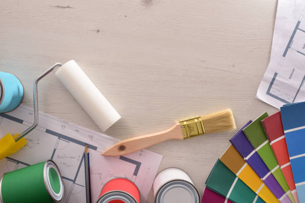 istock Decorator table with painting project and housing renovation background 1094442474