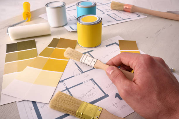 istock Decorator working for an interior housing painting project 1094442518