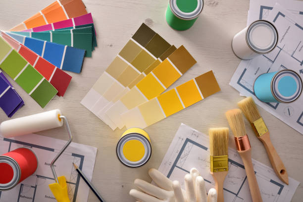 istock Decorator table with painting project and housing renovation top view 1094442550