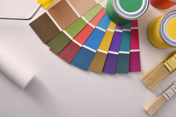 istock Tools for painting houses on white table top view 1094442564