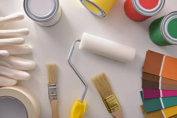 istock Tools for painting houses on white table general view top 1094442586