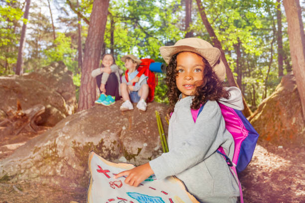 istock Summer camp orientation kids activities in forest 1094443536