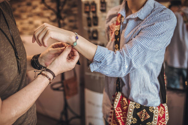 istock Lady trying on a bracelet 1094445082