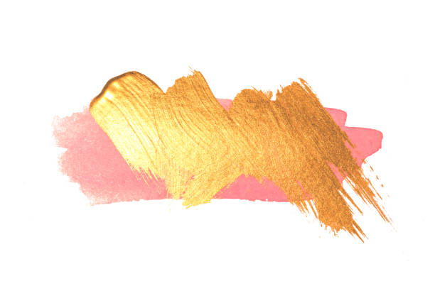 istock Abstract golden and pink watercolor stains on white background 1094448270