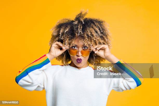 Funky Afro Girl Against Yellow Background Stock Photo - Download Image Now - Funky, One Woman Only, Women