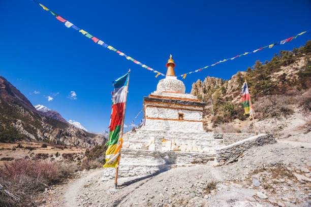 istock Buddhist stupa on Annapurna circuit trek. Himalayan mountains. Nepal. 1094450276