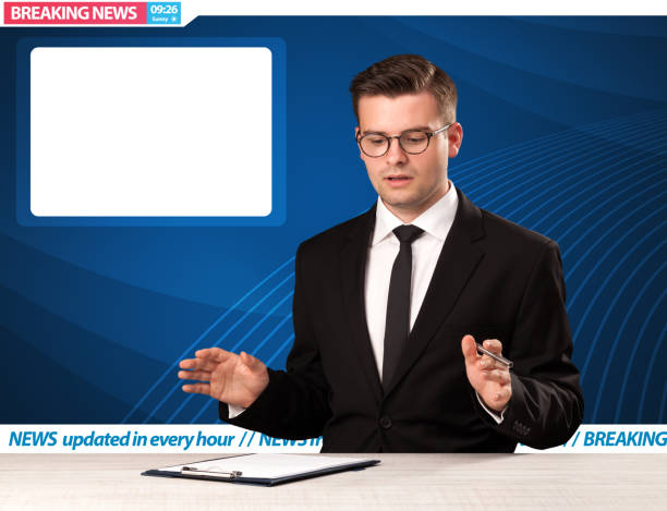 istock Television reporter telling breaking news at his studio desk with copy space 1094450956