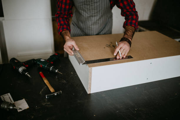 istock Young family is working in the joinery 1094455404