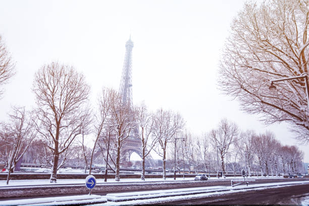 istock Snow-covered streets of Paris and the Eiffel Tower 1094461754