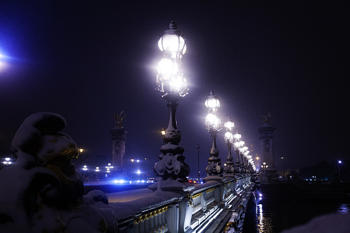 Beautiful lights of the Pont Alexandre III at night, Paris, France