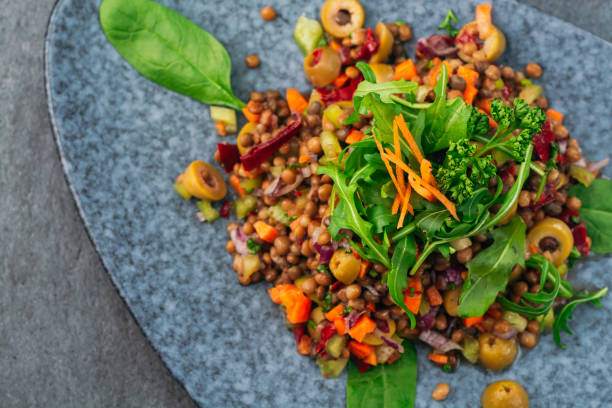 istock Lentil salad with vegetables and olives 1094464314