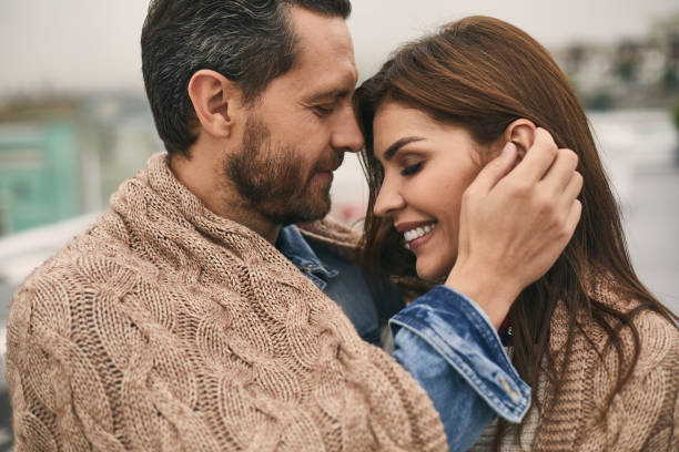 istock Happy couple is spending time together on terrace 1094470376