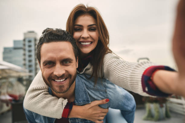 istock Smiling couple is having funny rest outdoor 1094470392