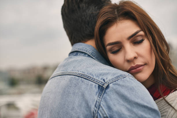 istock Happy lady is hugging her man outdoor 1094470408