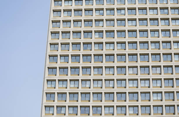 istock View of an office building with blue sky 1094473084