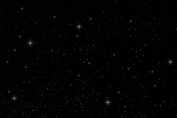 istock Digitally generated set of twinkling stars in deep space on a black sky background 1094473516