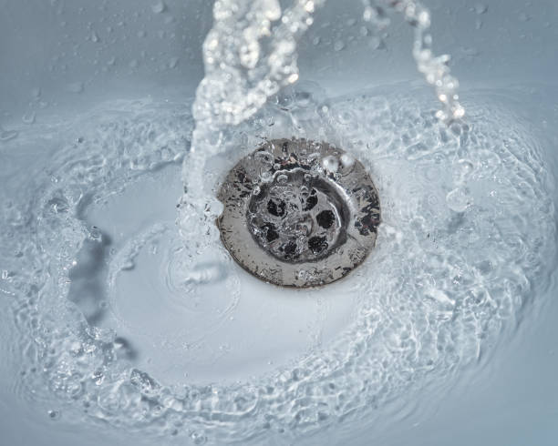 istock Water flowing in sink. 1094473810