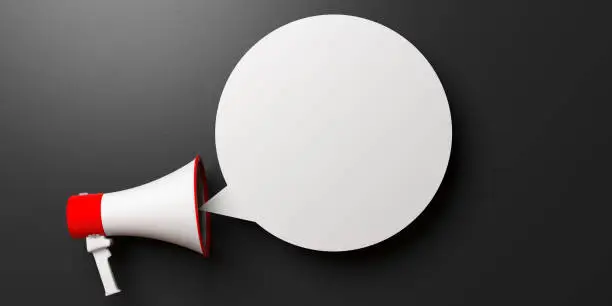 Photo of Megaphone and blank bubble isolated on black background, copy space. 3d illustration