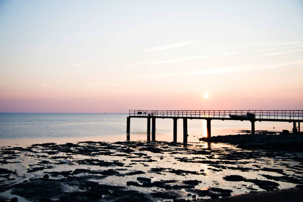 istock Path to the sea at sunset 1094476122