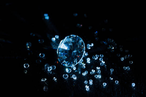 istock big and small transparent clear diamonds isolated on black 1094477188