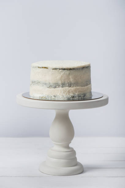 istock creamy cake on tray isolated on white 1094479024
