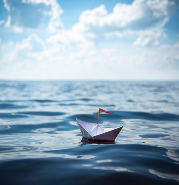 istock Sail away - Paper Boat 1094482510