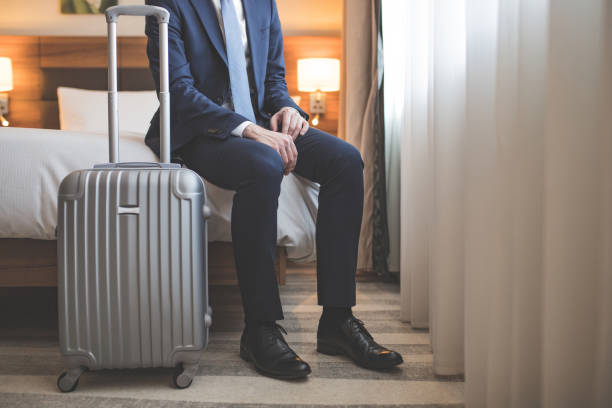 istock Young businessman in suit with a suitcase 1094488188