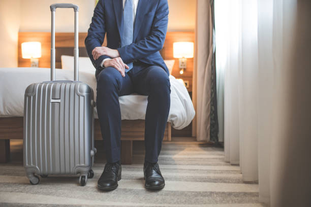 istock Young businessman with a suitcase 1094488208