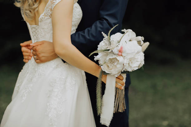 istock Bride with flowers in your hand 1094490306